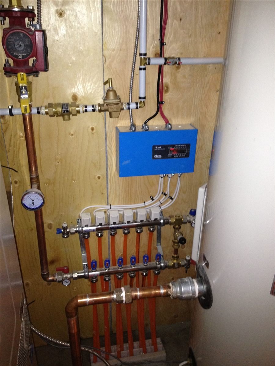 In-floor geothermal heating system