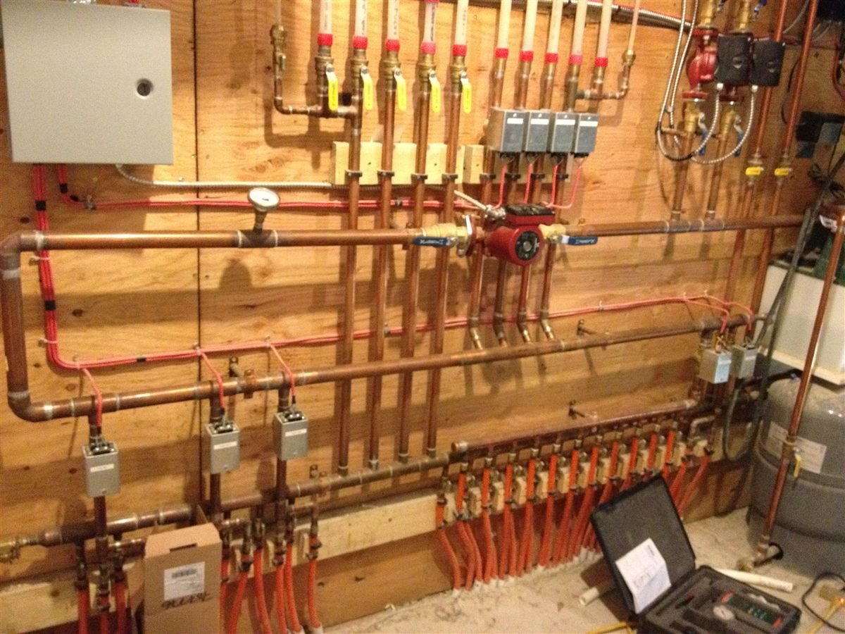 In-floor geothermal heating system