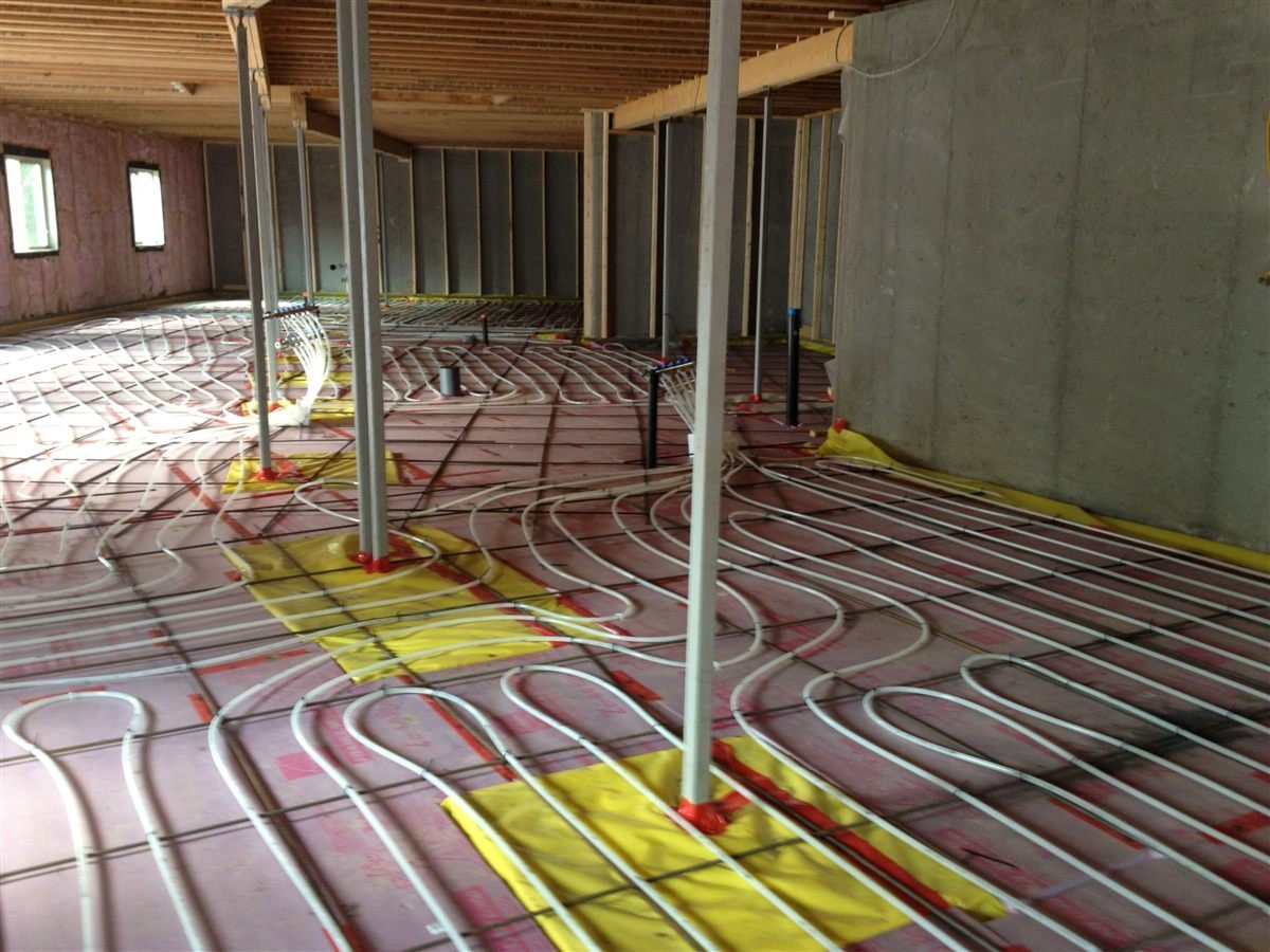 In-floor geothermal heating system