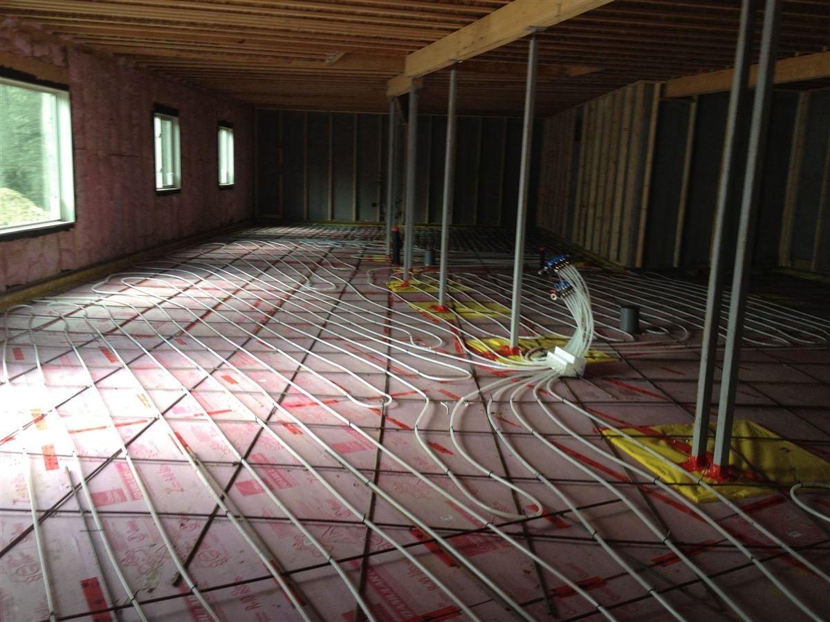 In-floor geothermal heating system