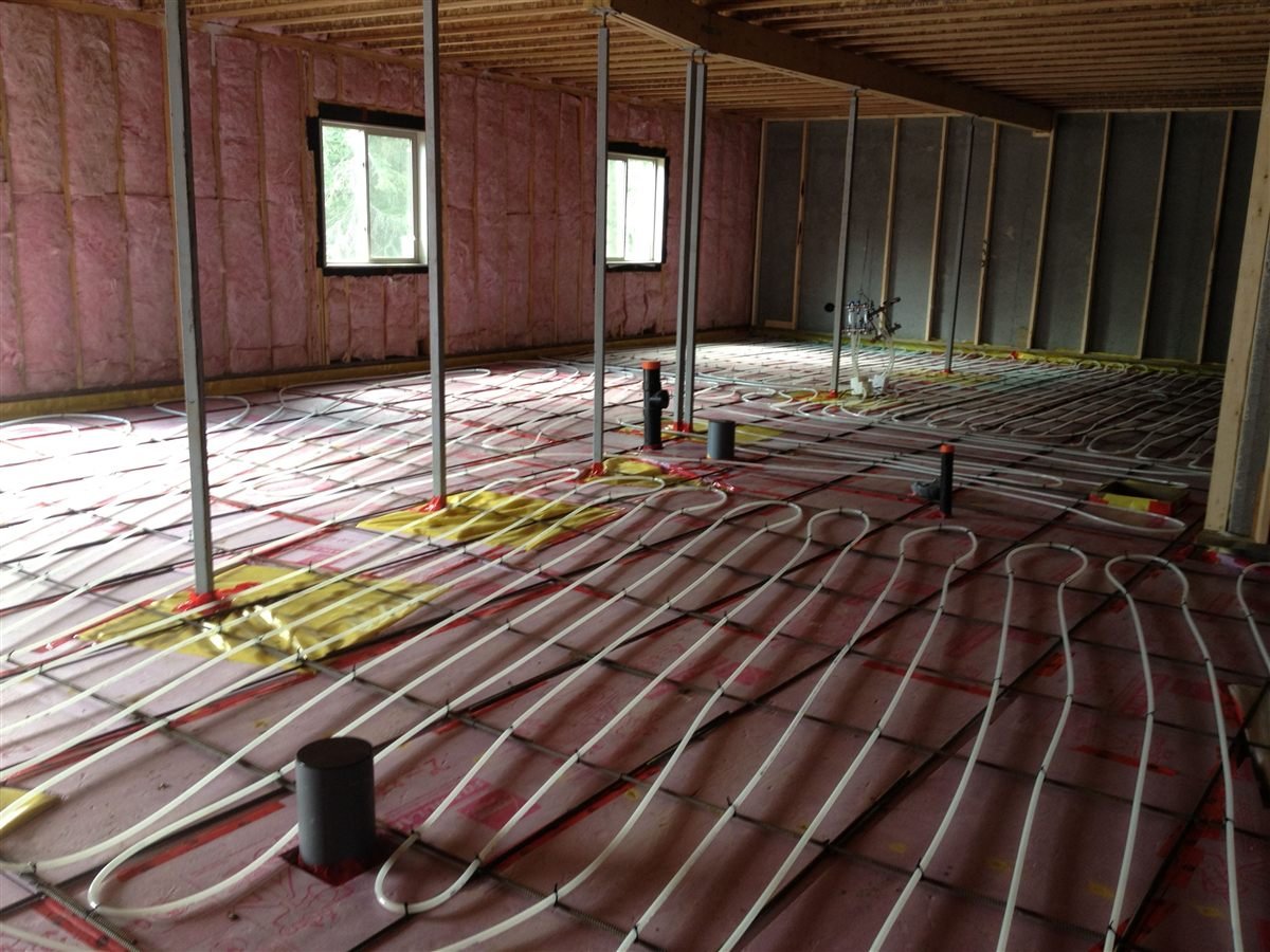 In-floor geothermal heating system