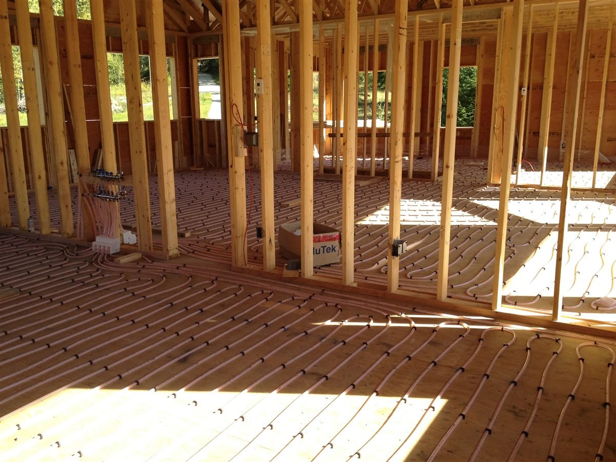 In-floor geothermal heating system