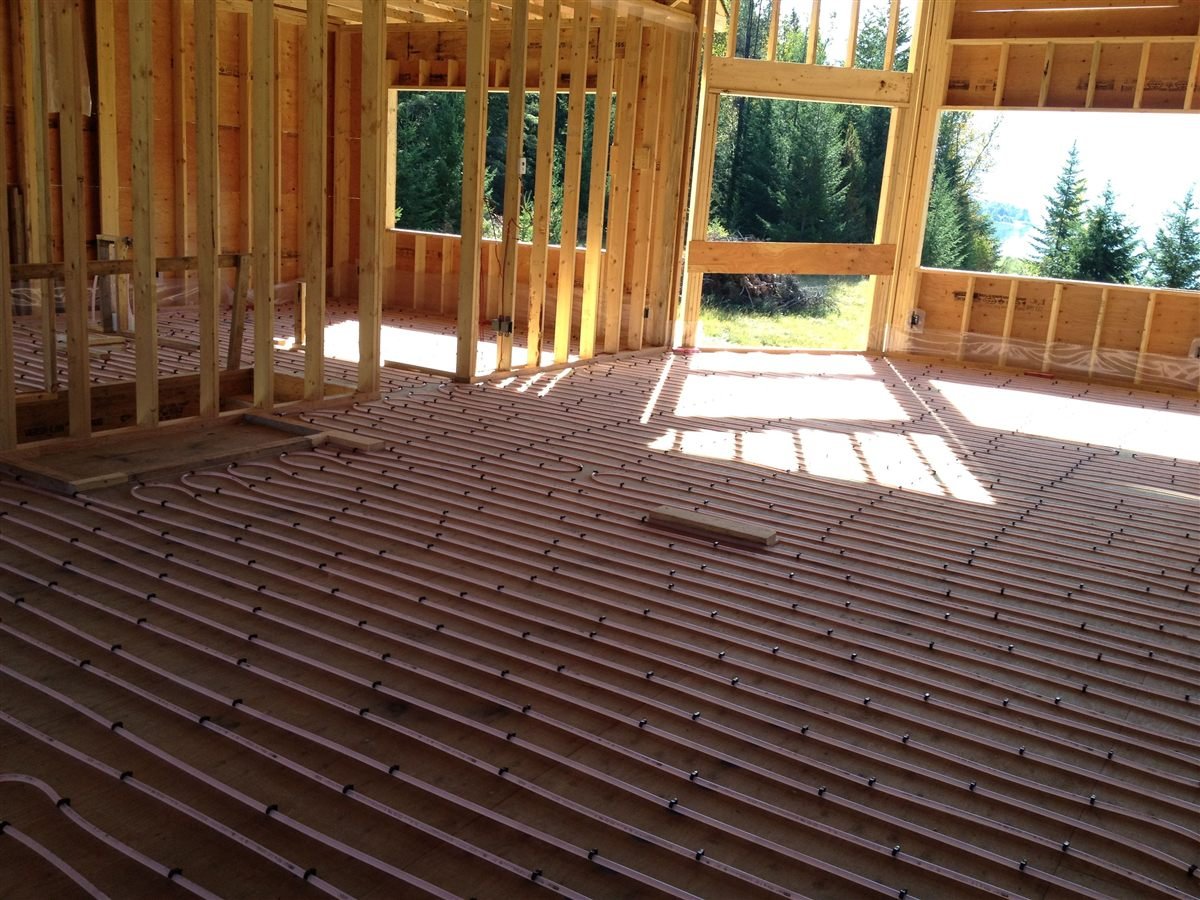 In-floor geothermal heating system