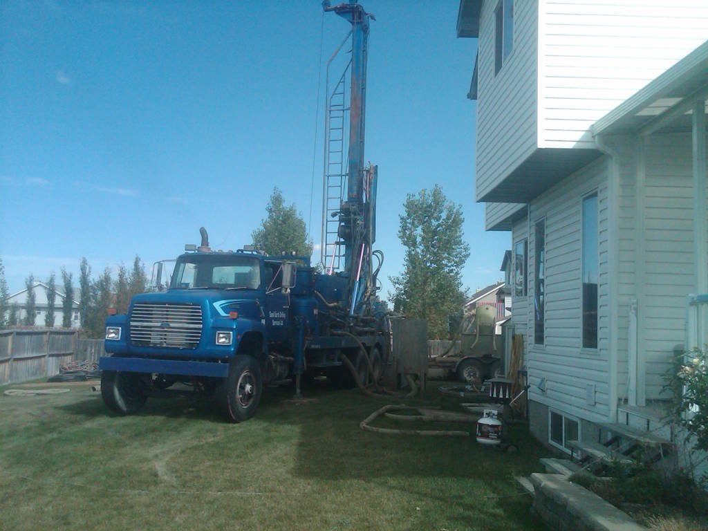 Vertical geothermal loop installation